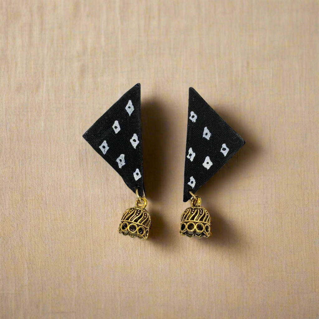 Black triangle-shaped earrings with gold bell charms on a white background