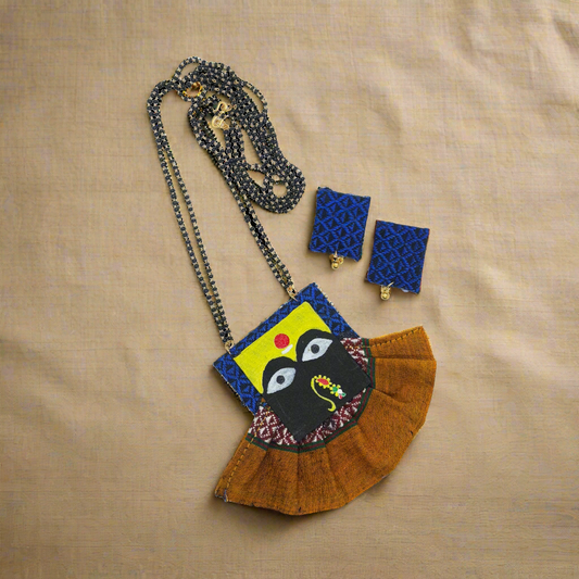 Jewelry set with necklace, earrings, and pendant on a white background