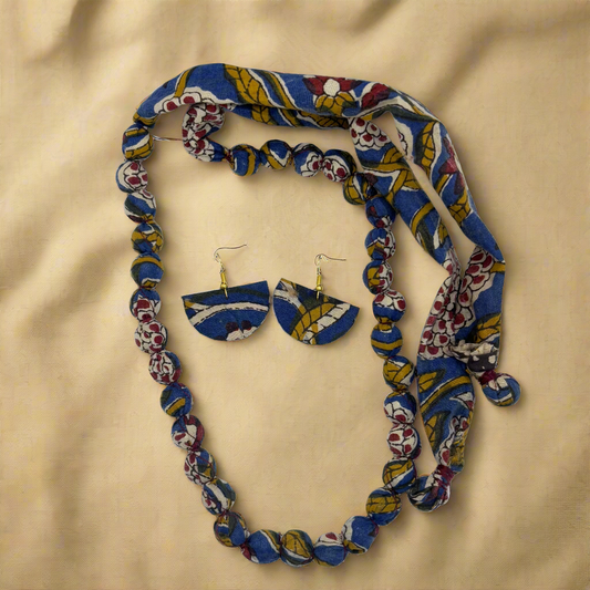Colorful beaded necklace and earrings set on a white background