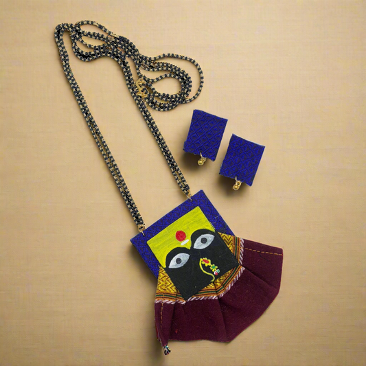 Colorful handbag with matching necklace and earrings on a white background